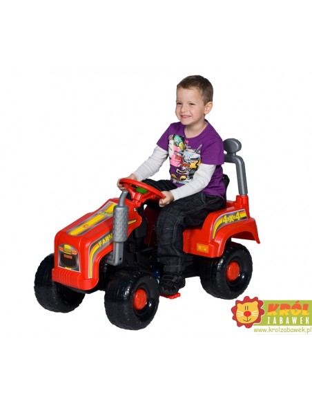 Ogromny niebieski traktor na pedały dla dzieci z kaskiem