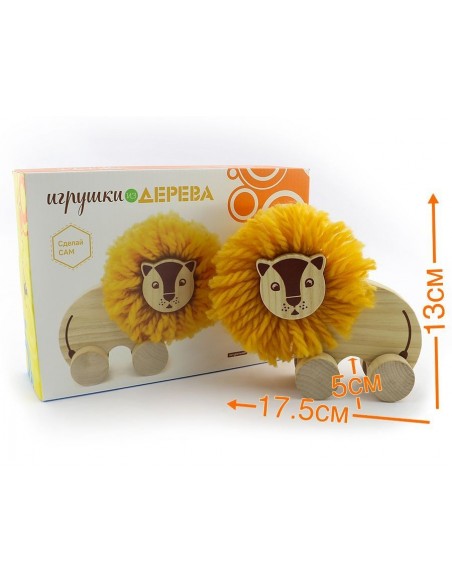 Drewniany lew pomponik